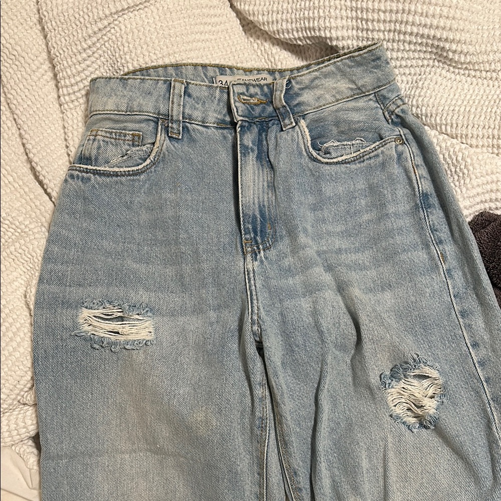 Distressed Light Blue Jeans